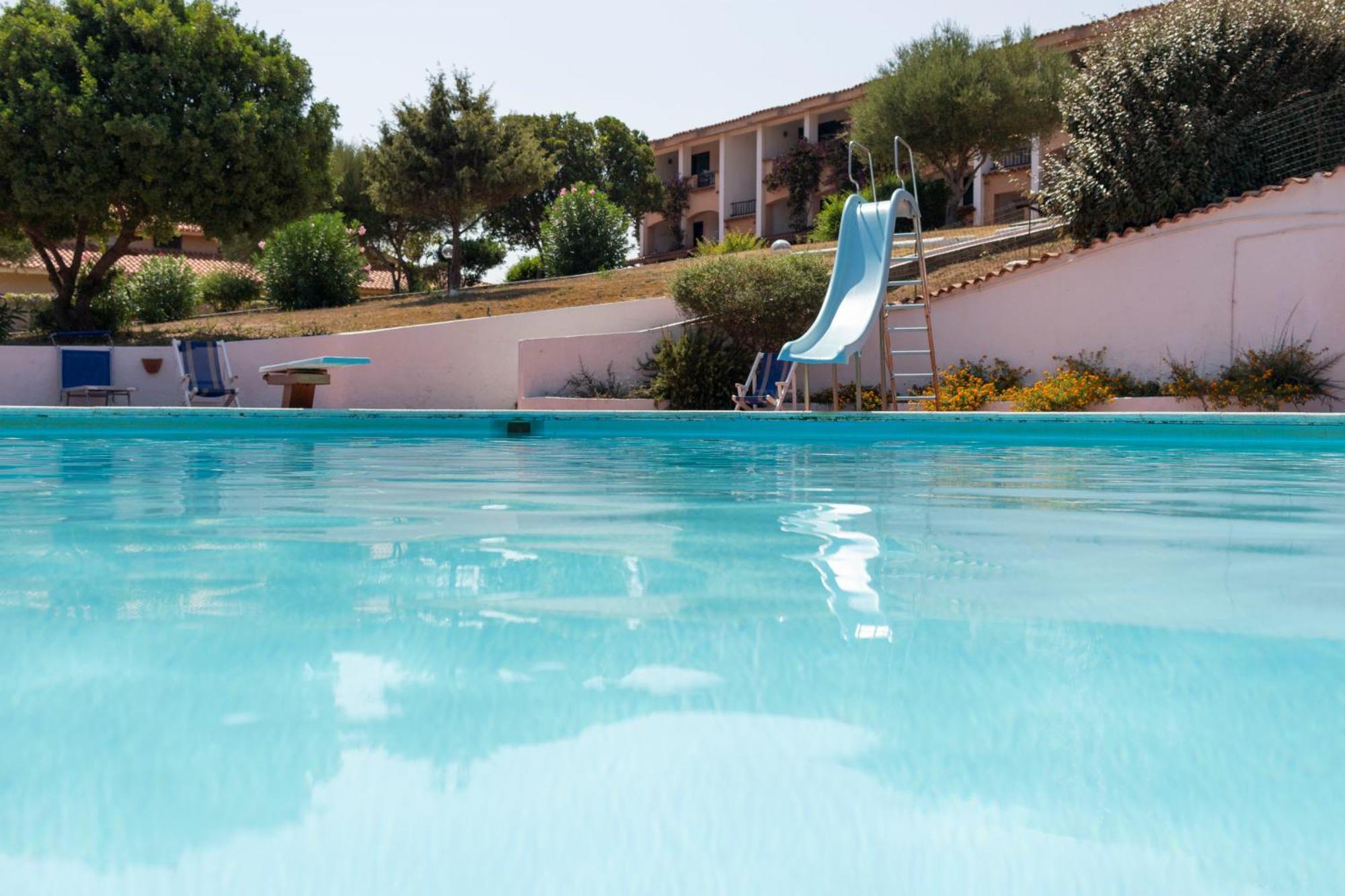 Appartamento Trilocale Vista Piscina Baja Sardinia Kültér fotó